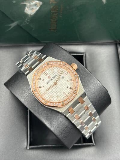 Montre bracelet acier et or