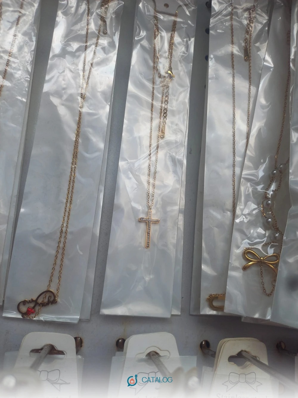 Colliers pendentifs dorés