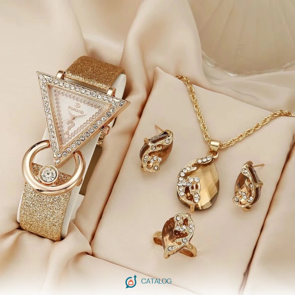 Ensemble bijoux et montre dorés