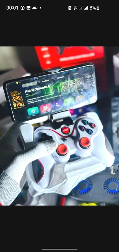 Manette de jeu avec support téléphone